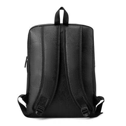 Black backpack shown from the back on a white background