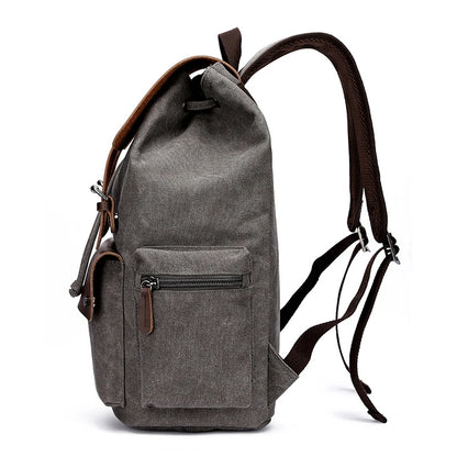Gray backpack with brown accents on a white background