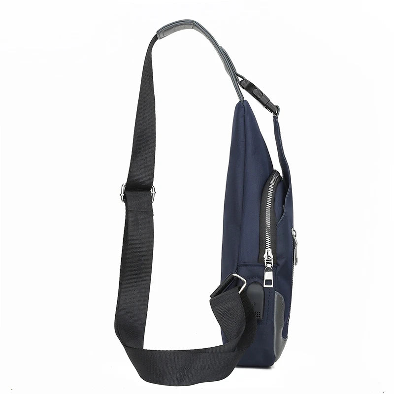 Navy sling bag with black strap on a white background