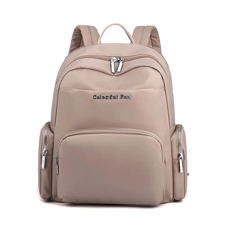 Beige backpack with 'Colorful Fox' branding on a white background