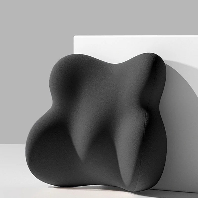 Black abstract sculpture on a gray background