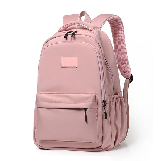 Pink backpack on a white background