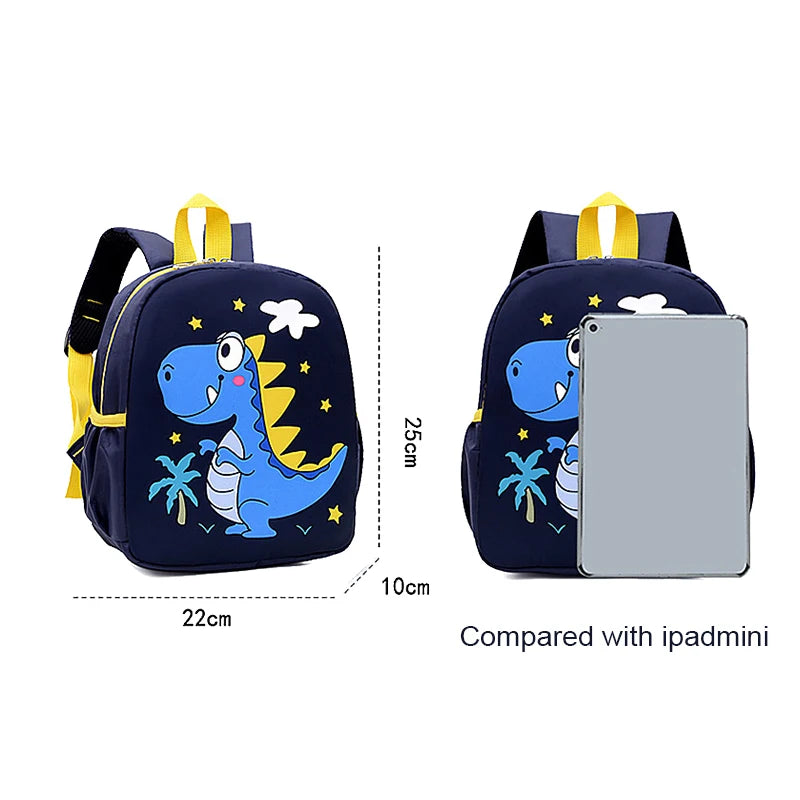 Children's backpack with dinosaur design, shown with dimensions and compared to an iPad mini.