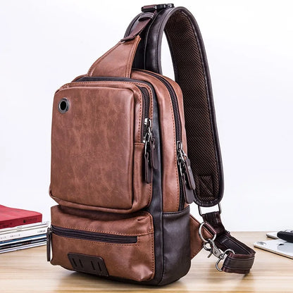 Brown leather sling bag on a light wooden surface with a white background