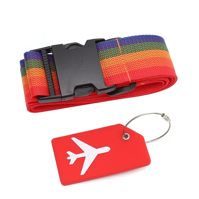 Colorful luggage strap with a black buckle and a red luggage tag with an airplane symbol on a white background.