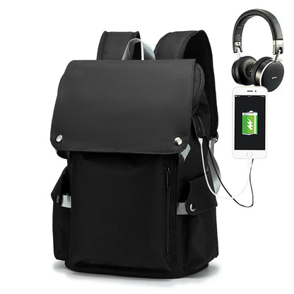 Black backpack with USB charging port and headphones on a white background