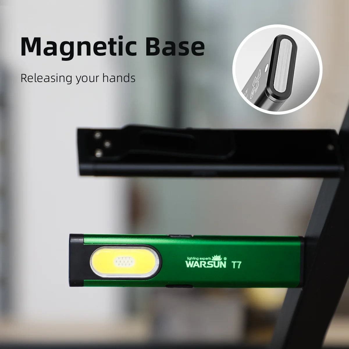 Green flashlight with magnetic base feature on a blurred background