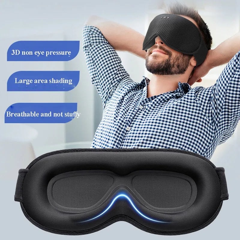 Man wearing a black sleep mask with text on non-eye pressure, shading, and breathability.