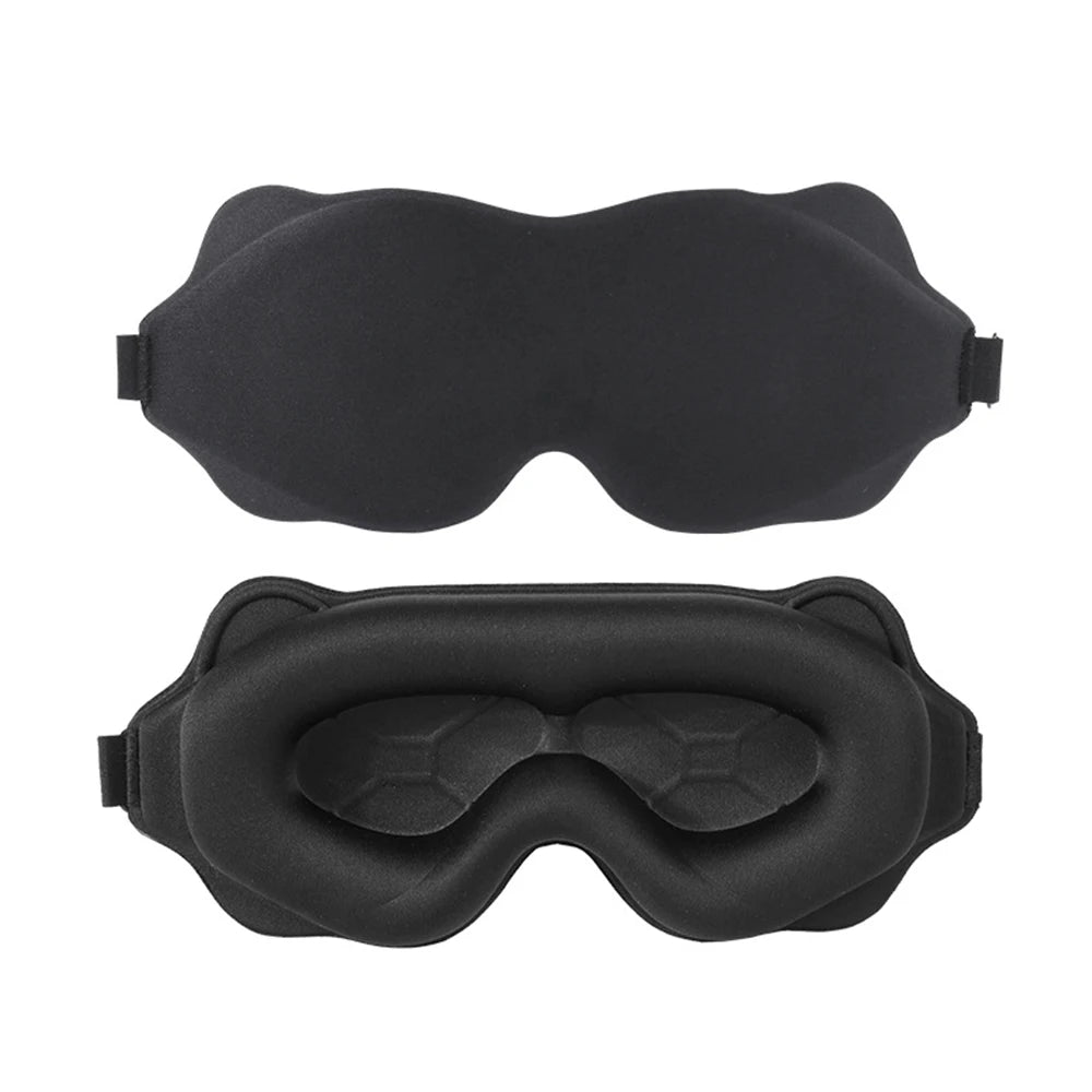Two black sleep masks on a white background