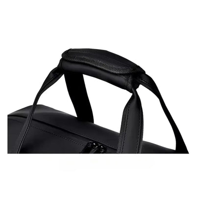 Close-up of ProGear Travel Duffle Bag handle, showcasing sturdy design and comfortable grip for easy carrying.