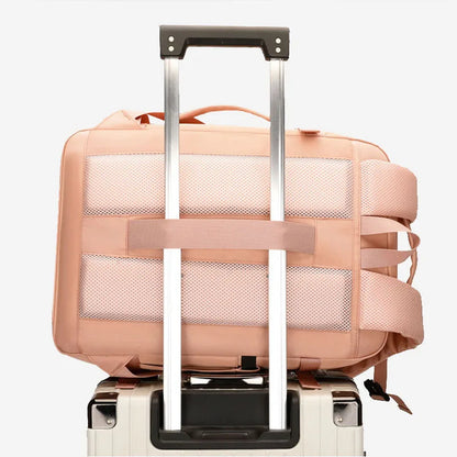 Pink suitcase with a white background