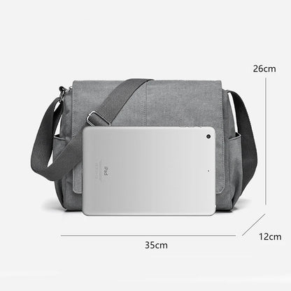 Gray shoulder bag with dimensions labeled on a white background