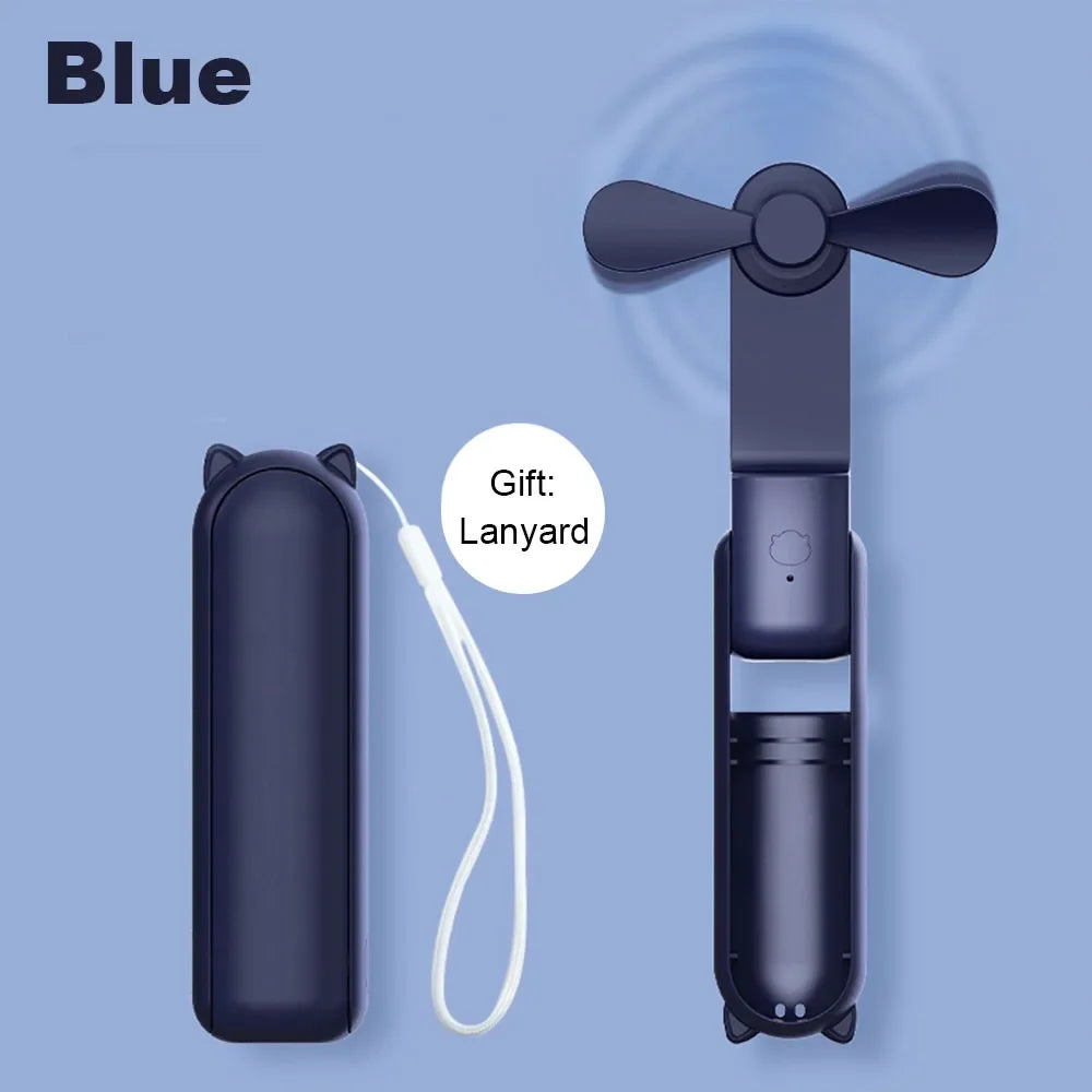 Blue handheld fan with carrying case and lanyard on a blue background