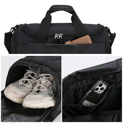 Black duffel bag with compartments for shoes and phone, on a white background
