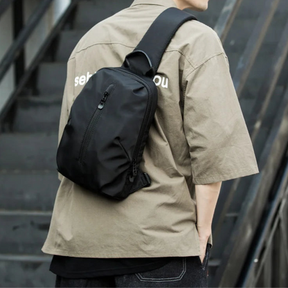 Person wearing a black backpack on a staircase
