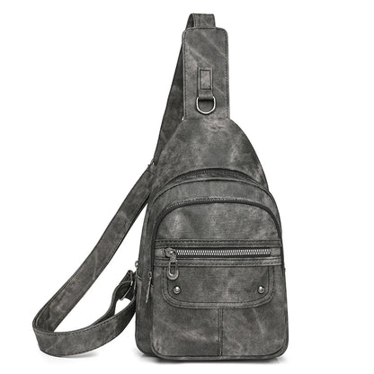 Gray suede sling bag on a white background