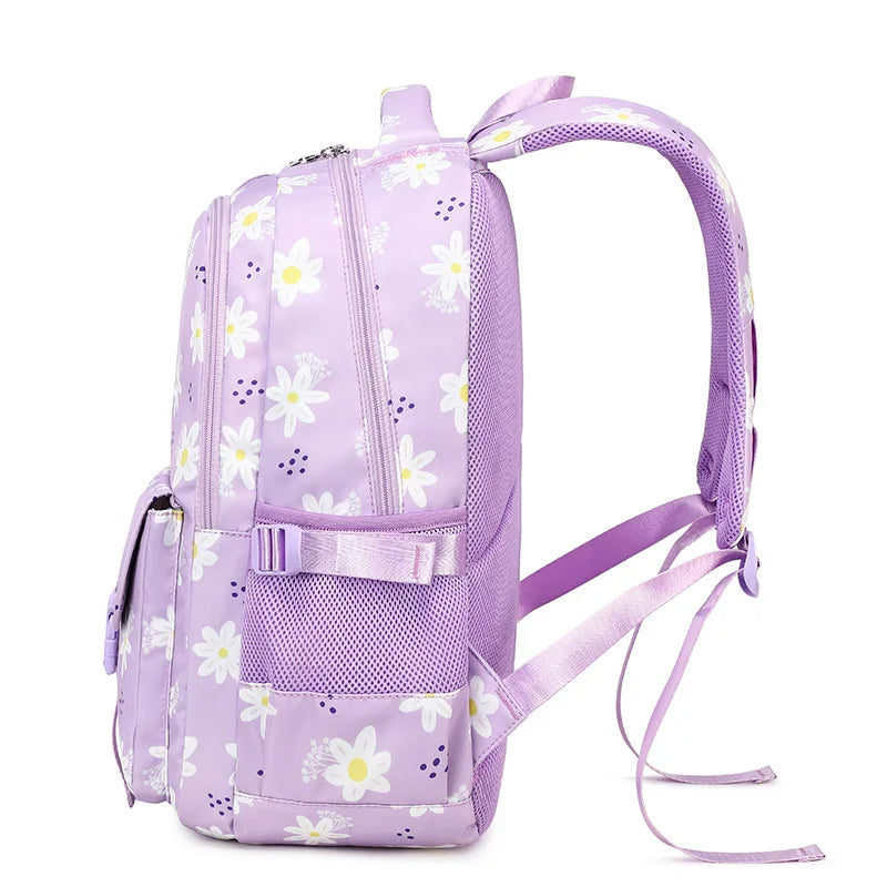 Purple backpack with floral pattern on a white background