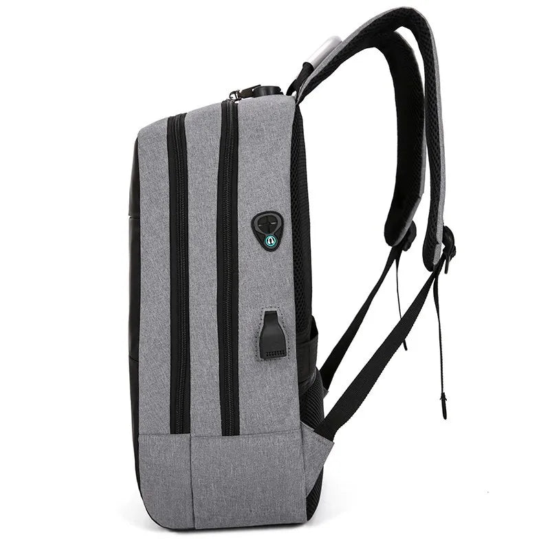 Gray backpack with black straps on a white background