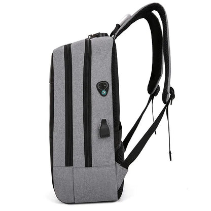 Gray backpack with black straps on a white background