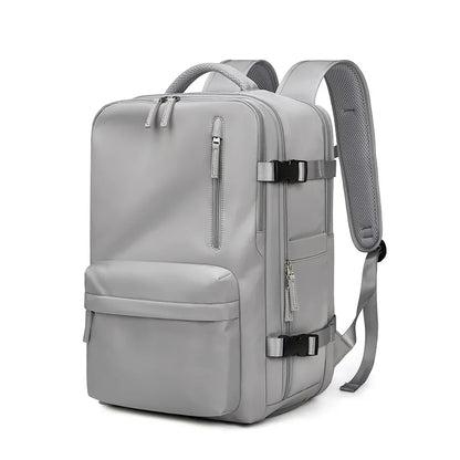 Gray backpack with multiple zippers on a white background