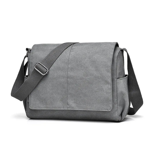 Gray messenger bag with a strap on a white background