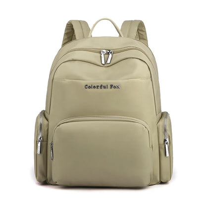 Beige backpack with 'Colorful Fox' branding on a white background
