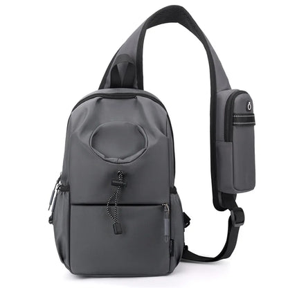 Gray sling bag with a strap on a white background