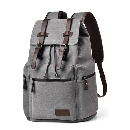 Gray backpack with brown straps on a white background