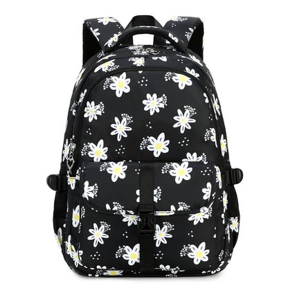 Black backpack with white floral patterns on a white background