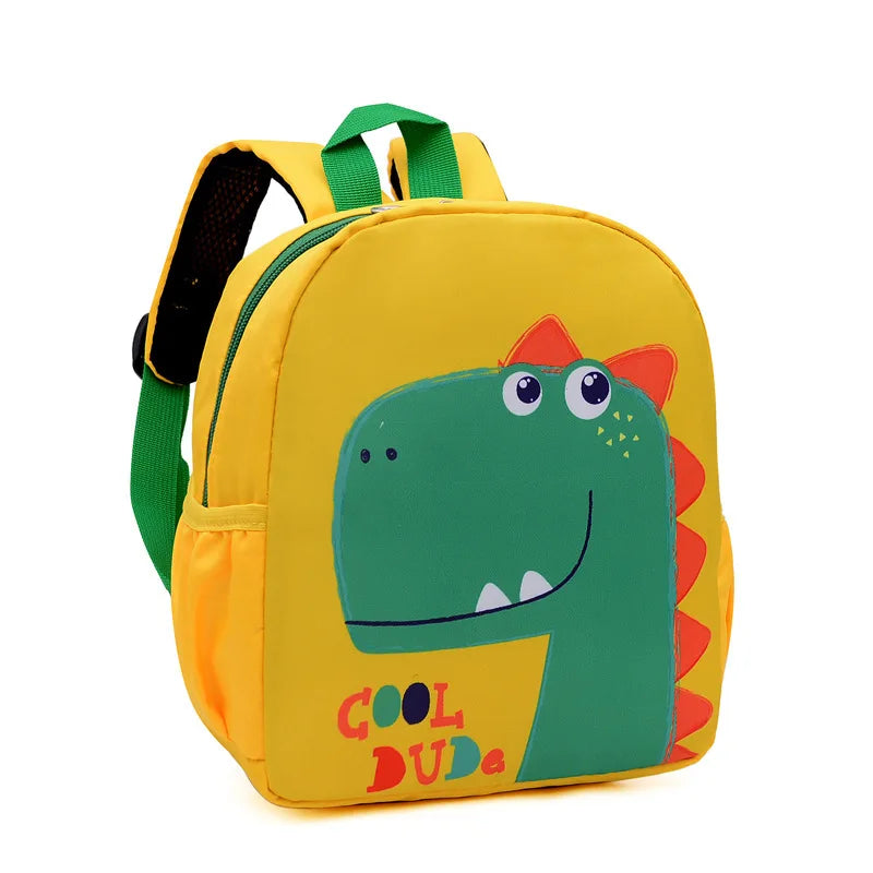 Yellow backpack with a dinosaur design and 'Cool Dude' text on a white background