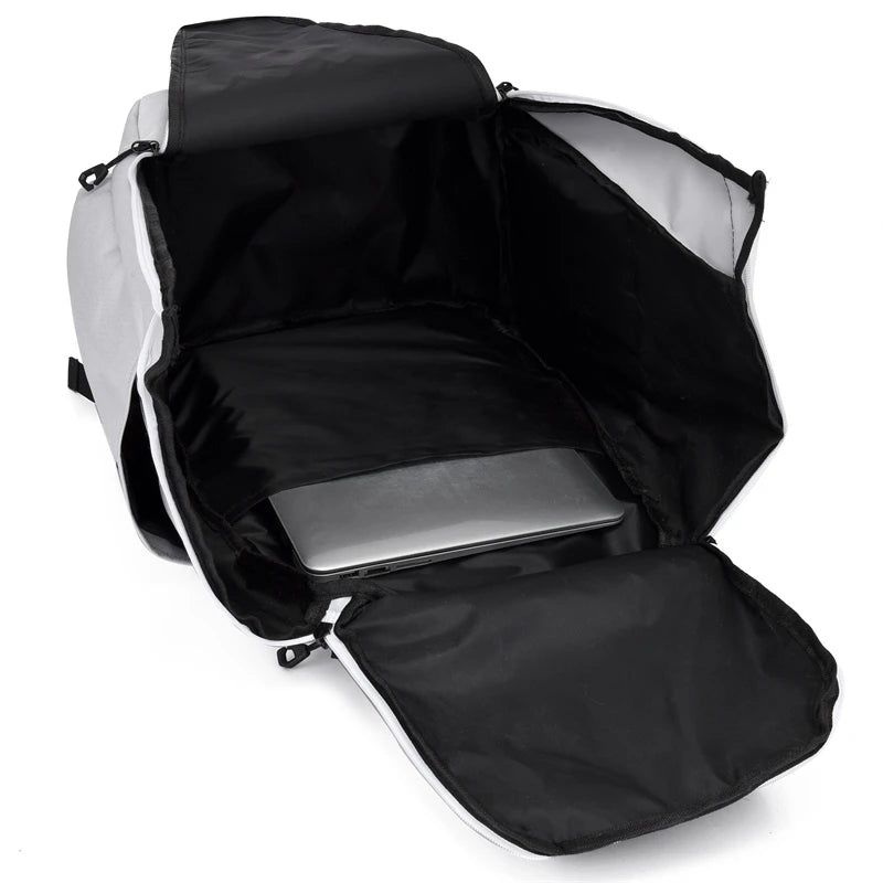 Black and white backpack with a laptop compartment on a white background
