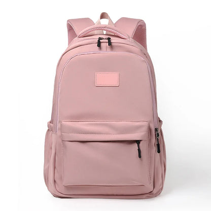 Pink backpack on a white background