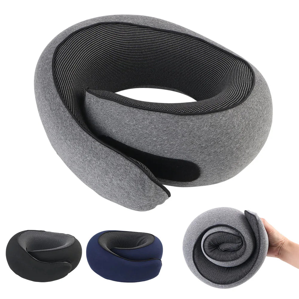 Gray neck pillow with black mesh on a white background