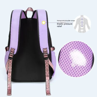 Purple backpack with honeycomb shoulder straps and elastic pressure relief features on a white background.