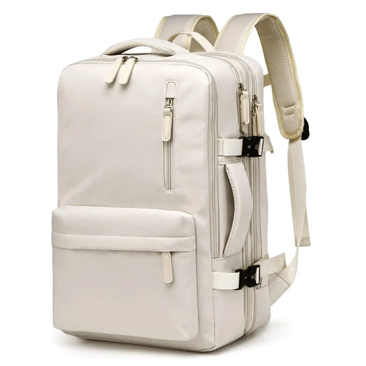 Beige backpack with multiple pockets and zippers on a white background
