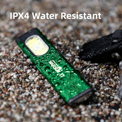 Green flashlight on sand with 'IPX4 Water Resistant' text