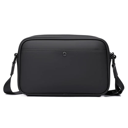 Black shoulder bag on a white background