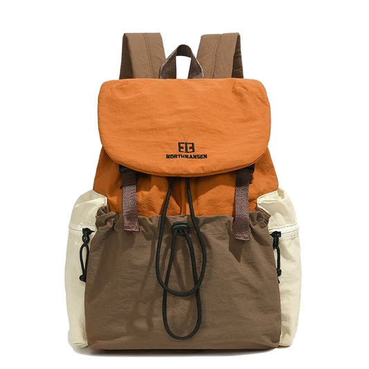 Multicolored backpack with visible brand logo on a white background