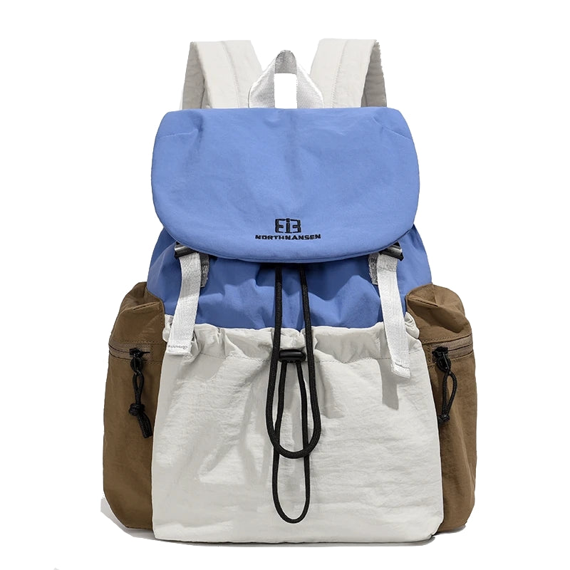 Multicolored backpack with visible brand logo on a white background