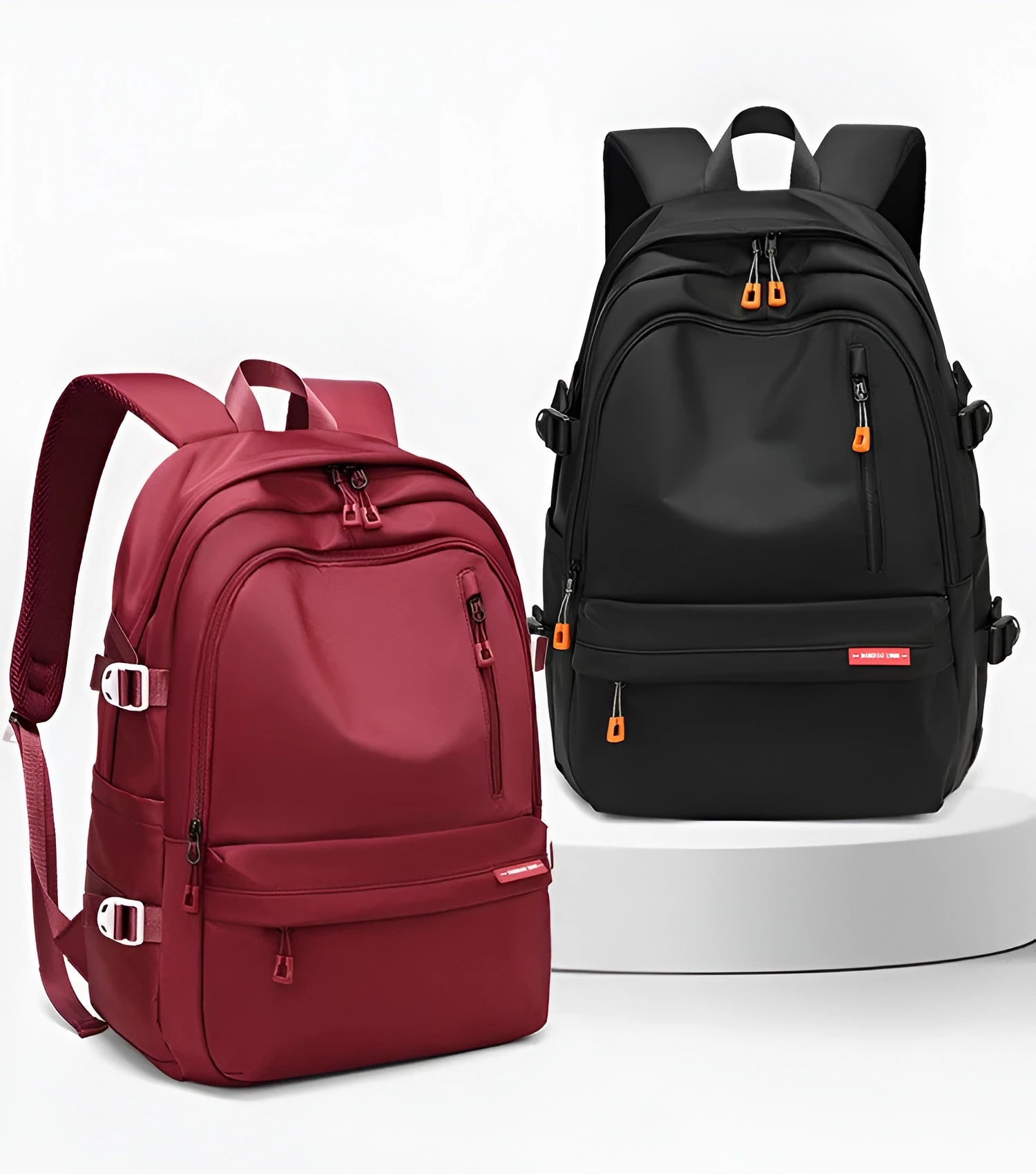 Red and black backpacks on a white background