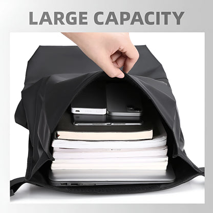 Black backpack with large capacity filled with books, a laptop, and electronic devices.