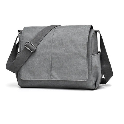 Gray shoulder bag with a strap on a white background