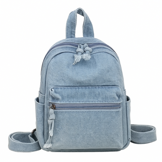 Light blue denim backpack with a strap on a white background