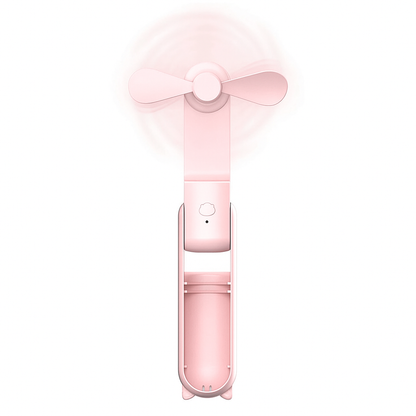 Pink handheld fan on a white background