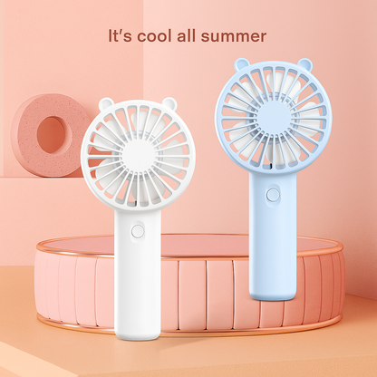 Two handheld fans, one white and one blue, on a pink background with text 'It's cool all summer'.
