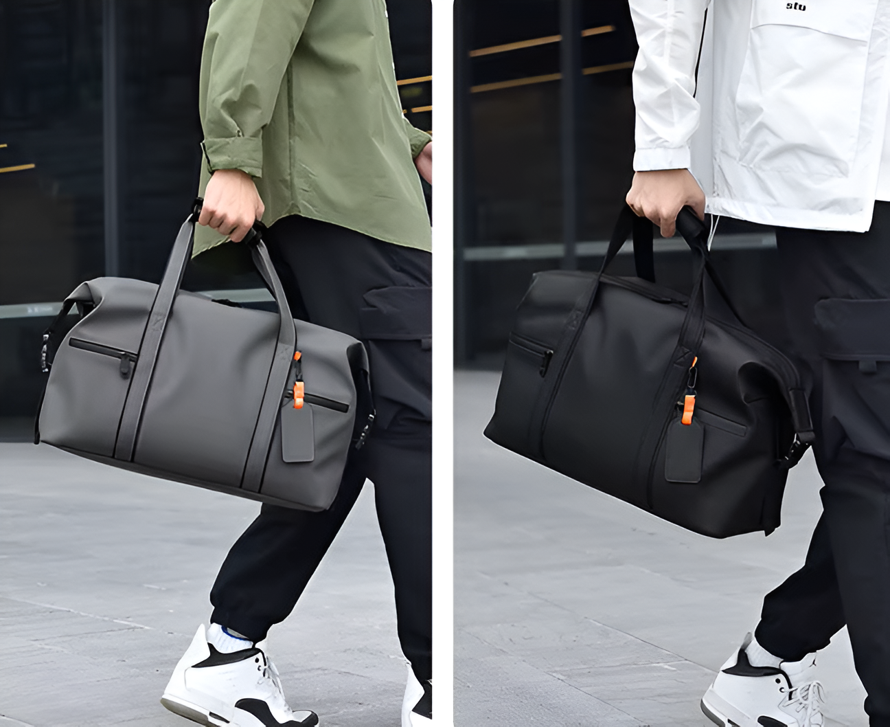 Two people carrying duffel bags, one gray and one black, on a city street.