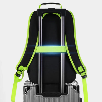Backpack with green straps attached to a suitcase on a light gray background