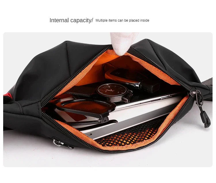 Black and orange bag with items inside on a white background