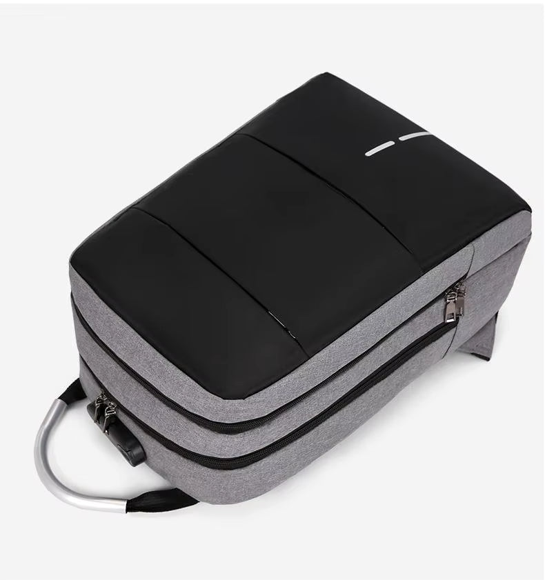 Gray and black backpack on a white background